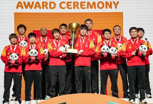 1733668123208078040.jpg (体育)(8)乒乓球——混合团体世界杯决赛:中国队夺冠XxjpseC007383_20241208_PEPFN0A001.jpg